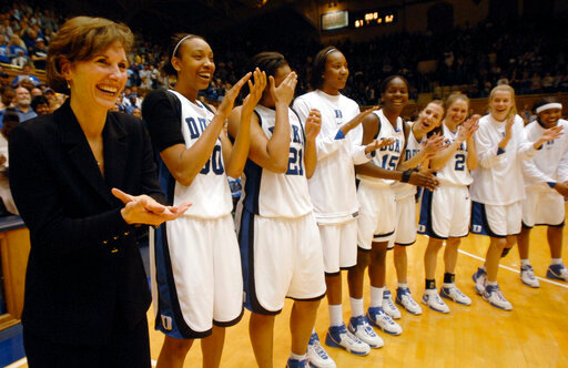 FILE - Then-Duke head coach Gail Goestenkors celebrates her team's 67-62 win over North Carolina after a basketball game in Durham, N.C. on Feb. 25, 2007. Goestenkors, a Women's Basketball Hall of Famer and Kentucky women&rsquo;s basketball assistant, has retired from on-court coaching but will remain on coach Kyra Elzy&rsquo;s staff until her replacement is hired. (AP Photo/Sara D. Davis, File)