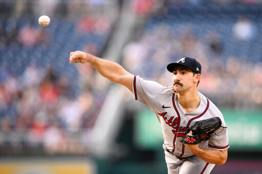 Atlanta Braves starting pitcher Spencer Strider throws during the first inning of a baseball game against the Washington Nationals, Wednesday, June 15, 2022, in Washington. (AP Photo/Nick Wass)