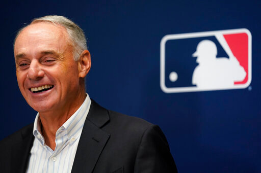 Major League Baseball Commissioner Rob Manfred speaks to reporters following an owners' meeting at MLB headquarters in New York, Thursday, June 16, 2022. (AP Photo/Seth Wenig)