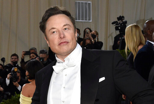 FILE - Elon Musk attends The Metropolitan Museum of Art's Costume Institute benefit gala celebrating the opening of the &quot;In America: An Anthology of Fashion&quot; exhibition on May 2, 2022, in New York. Musk is expected to meet with Twitter employees Thursday, June 16, 2022 in an apparent effort to assuage concerns about his $44 billion deal to acquire the social platform. (Photo by Evan Agostini/Invision/AP)