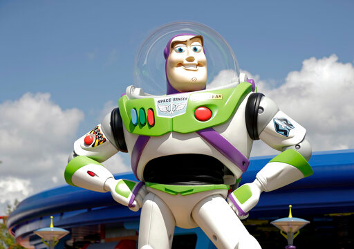 FILE - Character Buzz Lightyear stands near the entrance to the Aliens Swirling Saucers ride at Toy Story Land in Disney's Hollywood Studios at Walt Disney World in Lake Buena Vista, Fla., June 23, 2018. Malaysia's film censors said Friday, June 17, 2022, that it was Disney's decision to ax the animated film &ldquo;Lightyear&rdquo; from the country's cinemas after refusing to cut scenes promoting homosexuality. (AP Photo/John Raoux, File)