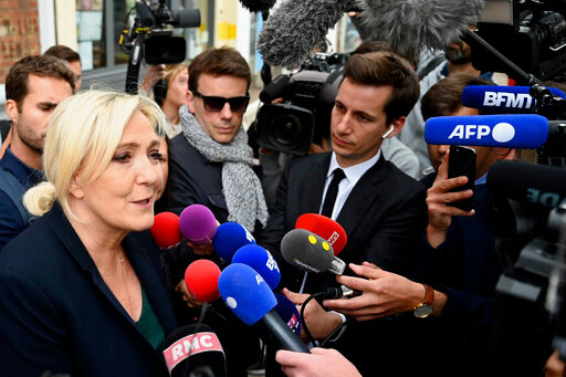 French far-right leader Marine Le Pen adresses reporters Monday, June 20, 2022 in Henin-Beaumont, northern France. French President Emmanuel Macron's centrist alliance was projected to lose its majority despite getting the most seats in the final round of parliamentary elections Sunday, while the far-right National Rally appeared to have made big gains. (AP Photo)