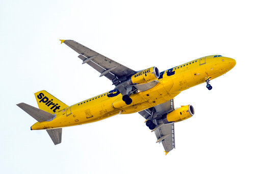 FILE - A Spirit Airlines aircraft approaches Philadelphia International Airport on Oct. 22, 2021. JetBlue is boosting its offer Monday, June 20, 2022, to buy Spirit Airlines, raising the stakes again in the bidding war over the nation&rsquo;s biggest budget airline. (AP Photo/Matt Rourke, File)