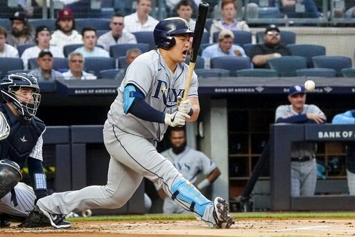 Tampa Bay Rays' Ji-Man Choi swings at a pitch during the first inning of the team's baseball game against the New York Yankees, Thursday, June 16, 2022, in New York. Choi walked on the at-bat. (AP Photo/Bebeto Matthews)