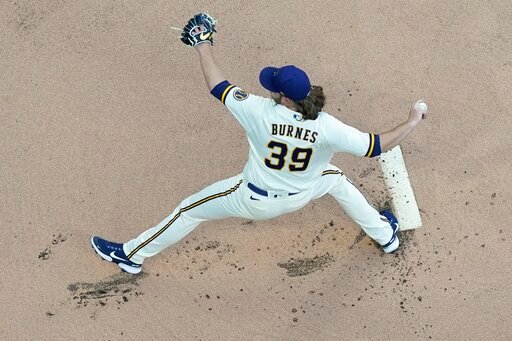 Milwaukee Brewers starting pitcher Corbin Burnes throws during the first inning of a baseball game against the St. Louis Cardinals Monday, June 20, 2022, in Milwaukee. (AP Photo/Morry Gash)