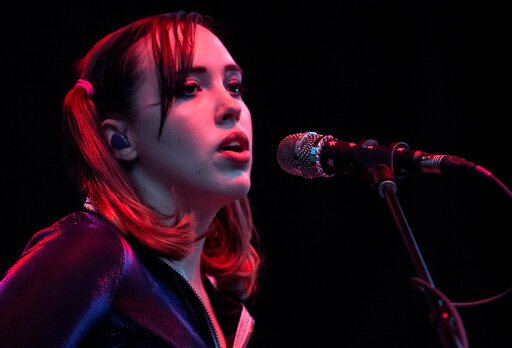 FILE - Sophie Allison, better known by her stage name Soccer Mommy, performs onstage at the 7th annual Shaky Knees Music Festival in Atlanta on May 4, 2019.  Soccer Mommy's latest album, &ldquo;Sometimes, Forever,&rdquo; releases this week. (AP Photo/Ron Harris, File)