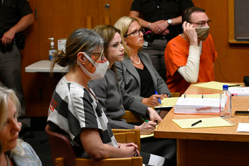 From left, Jennifer Crumbley, attorney Shannon Smith, attorney Mariell Lehman, and James Crumbley sit during a hearing in the courtroom of Judge Cheryl Matthews, Monday, June 27, 2022 at Oakland County Circuit Court in Pontiac Mich. Lawyers representing the parents of a Michigan teenager charged in a shooting at Oxford High School that left four of his fellow students dead say they plan to call him to testify at the couple&rsquo;s trial. (Jose Juarez/Detroit News via AP)