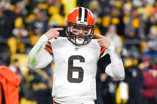 FILE - Cleveland Browns quarterback Baker Mayfield (6) gestures during the second half an NFL football game against the Pittsburgh Steelers, Monday, Jan. 3, 2022, in Pittsburgh. Baker Mayfield said the Cleveland Browns have work ahead if they want him to help them through their situation with Deshaun Watson. Mayfield, speaking at his football camp near the University of Oklahoma&rsquo;s campus on Tuesday, June 28, didn&rsquo;t entirely close the door on stepping in if needed.(AP Photo/Don Wright, File)