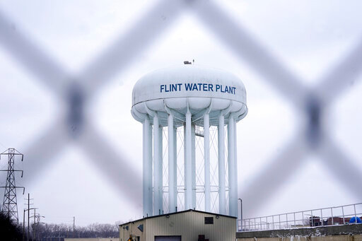 FILE - The Flint water plant tower is seen, Thursday, Jan. 6, 2022, in Flint, Mich. The Michigan Supreme Court has ruled that charges related to the Flint water scandal against former Gov. Rick Snyder, his health director and seven other people must be dismissed. The justices found Tuesday, June 28, 2022 that the judge had no authority to issue the indictments. It&rsquo;s an astonishing defeat for Attorney General Dana Nessel. (AP Photo/Carlos Osorio, File)