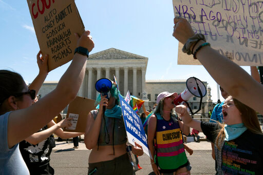 FILE - Anti-abortion demonstrators and abortion right activists protest outside the Supreme Court in Washington, on June 25, 2022. St. Luke's Health Kansas City, operator of 16 hospitals, briefly stopped providing emergency contraception over concerns that the state&rsquo;s abortion ban could put doctors at risk of criminal charges if they provide the medication known as the morning-after pill, even for sexual assault victims, only to restart the procedures on Wednesday, June 29, 2022. (AP Photo/Jose Luis Magana, File)
