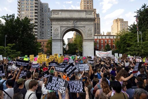 FILE - Abortion rights activists gather for a protest following the U.S. Supreme Court's decision to overturn Roe v. Wade, at Washington Square Park, Friday, June 24, 2022, in New York. The Supreme Court&rsquo;s overturning of Roe v. Wade has ushered in a new era of funding on both sides of the abortion debate. With the legality of abortion now up to individual states to determine, an issue that was long debated by legislators and philanthropists when it was merely theoretical is suddenly a real-world circumstance for people across the country.  (AP Photo/Yuki Iwamura)