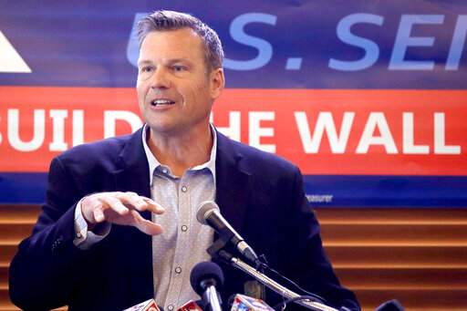 FILE - Former Kansas Secretary of State Kris Kobach speaks in Leavenworth, Kan., on July 8, 2019. Kansas voters have said no to Kobach twice over the past four years., but the immigration hard-liner is pursuing a political comeback. Kobach is running for Kansas attorney general after losing a general election for governor in 2018 and a Republican primary for the U.S. Senate in 2020. (AP Photo/Charlie Riedel, File)