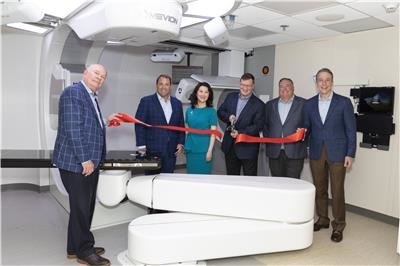 Leaders gathered to cut the ribbon on the new Mercy Proton Therapy Center. Left to right: Dr. David Meiners, Mercy St. Louis President; Steve Mackin, Mercy President and CEO; Tina Yu, Mevion CEO and President; Dr. Robert Frazier, Division Chief of Radiation Oncology at Mercy St. Louis; Joe Pecoraro, Mercy St. Louis Executive Director of Oncology Services; John Timmerman, Mercy St. Louis Vice President of Operations. (Photo: Business Wire)