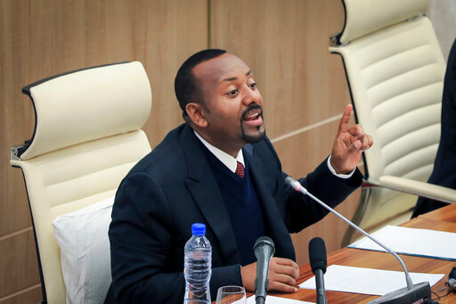 Ethiopia's Prime Minister Abiy Ahmed addresses lawmakers at the parliament in Addis Ababa, Ethiopia Thursday, July 7, 2022. Abiy said Thursday his government's police and soldiers are dying on a &quot;daily&quot; basis as the country grapples with insurgencies in Oromia and elsewhere. (AP Photo)