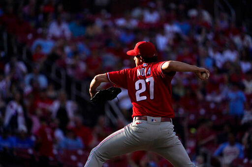Philadelphia Phillies starting pitcher Aaron Nola throws during the first inning of a baseball game against the St. Louis Cardinals Monday, July 11, 2022, in St. Louis. (AP Photo/Jeff Roberson)
