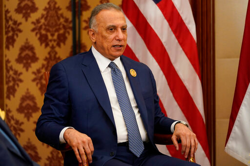 Iraqi Prime Minister Mustafa Al-Kadhimi talks during a meeting with US President Joe Biden, Saturday, July 16, 2022, in Jeddah, Saudi Arabia. (AP Photo/Evan Vucci)
