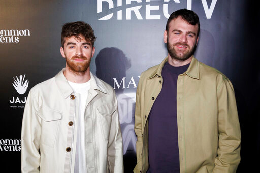 File - The Chainsmokers arrive at the day one of Maxim Big Game Weekend on Feb. 11, 2022, in Los Angeles. One of The Chainsmokers' latest hits is &quot;High&quot; and they're hoping to live up to their lyrics. The hit-making duo of Drew Taggart and Alex Pall have signed up to get into a pressurized capsule tethered to a stratospheric balloon in a few years and perform some 20 miles above the Earth. (Photo by Willy Sanjuan/Invision/AP, File)