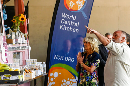 FILE - First lady Jill Biden and Spanish chef Jose Andres of the World Central Kitchen greet volunteers from the World Central Kitchen association during a visit to a reception center for Ukrainian refugees in Madrid, Spain, Tuesday, June 28, 2022. Donations from Fidelity Charitable climbed 11% to a record $4.8 billion for the first half of 2022, the nation&rsquo;s largest grantmaker announced Wednesday, July 20, 2022. Emergency relief organization International Medical Corps saw the number of Fidelity Charitable donors provide them a grant jump more than 1,000% compared to the first half of 2021, while World Central Kitchen grew more than 500%. (Oscar del Pozo/Pool Photo via AP, File)