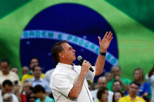 Brazil's President Jair Bolsonaro speaks during a rally to launch his reelection bid, in Rio de Janeiro, Brazil, Sunday, July 24, 2022. Brazil's general elections are scheduled for Oct. 2, 2022. (AP Photo/Bruna Prado)