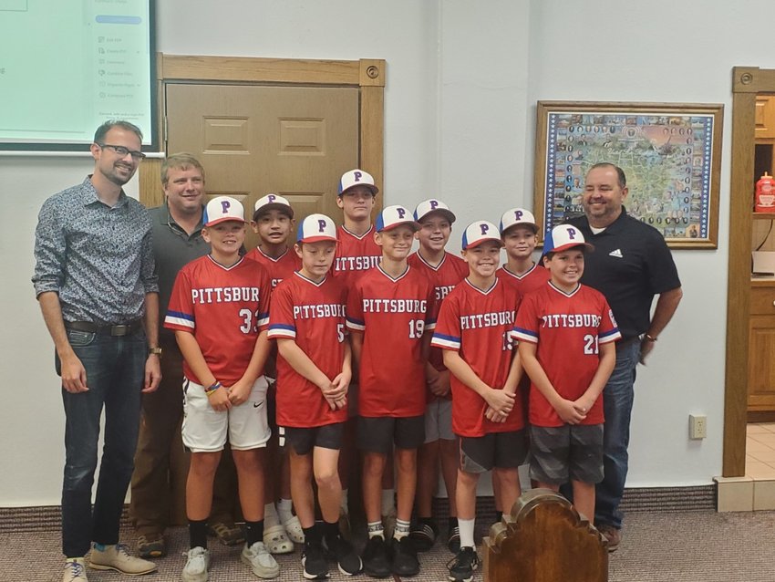 Pittsburg&rsquo;s 12 &amp; under All-Star Little League team poses with Crawford County Commissioners. The commission awarded the team $500 to help cover travel expenses as the team plays next week in the national championship in Indianapolis, Indiana.&nbsp;