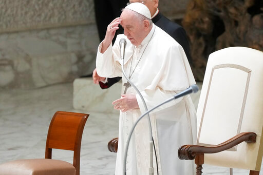 Pope Francis makes the sign of the cross during the weekly general audience at the Vatican, Wednesday, Aug. 3, 2022. (AP Photo/Gregorio Borgia)