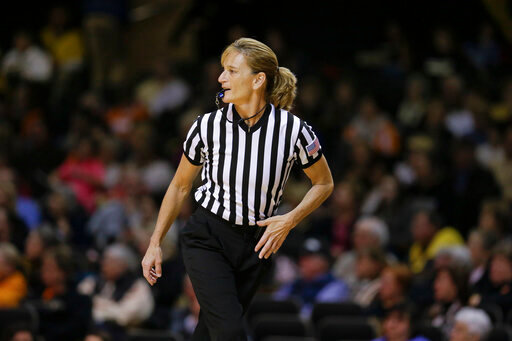 FILE - Referee Dee Kantner works in the second half of an NCAA college basketball game between Tennessee and Vanderbilt Monday, Jan. 5, 2015, in Nashville, Tenn. Kantner, a veteran referee of women&rsquo;s games who works for multiple conferences, finds it frustrating to have to justify equal pay. &ldquo;If I buy an airline ticket and tell them I&rsquo;m doing a women&rsquo;s basketball game they aren&rsquo;t going to charge me less,&rdquo; she said. (AP Photo/Mark Humphrey, FILE)