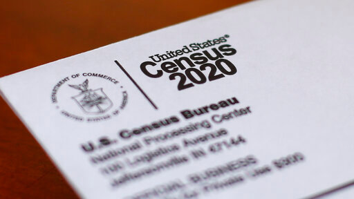 FILE  - This Sunday, April 5, 2020, file photo, shows an envelope containing a 2020 census letter mailed to a U.S. resident in Detroit.  A U.S. Census Bureau director couldn't be fired without cause and new questions to the census form would have to be vetted by Congress under proposed legislation which attempts to prevent in the future the type of political interference into the nation's head count that took place during the Trump administration. (AP Photo/Paul Sancya, File)