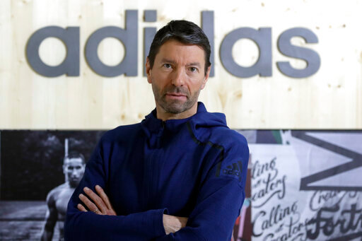 FILE -- CEO of German sports equipment company adidas AG, Kasper Rorsted, poses prior to the annual balance news conference in Herzogenaurach, Germany, Wednesday, March 14, 2018. Sports apparel maker Adidas said Monday that Kasper Rorsted, its CEO since 2016, will step down next year and it has started looking for a successor. (AP Photo/Matthias Schrader, file)