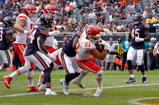 Kansas City Chiefs tight end Blake Bell scores during the first half of an NFL preseason football game against the Chicago Bears Saturday, Aug. 13, 2022, in Chicago. (AP Photo/David Banks)