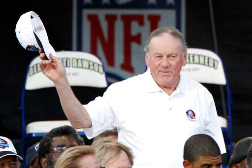 FILE - In this Aug. 4, 2012 file photo, Pro Football Hall of Fame member Len Dawson is introduced during the induction ceremony at the Pro Football Hall of Fame in Canton, Ohio. Dawson, who helped the Kansas City Chiefs to a Super Bowl title, died Wednesday, Aug. 24, 2022. He was 87. (AP Photo/Tom E. Puskar, File)