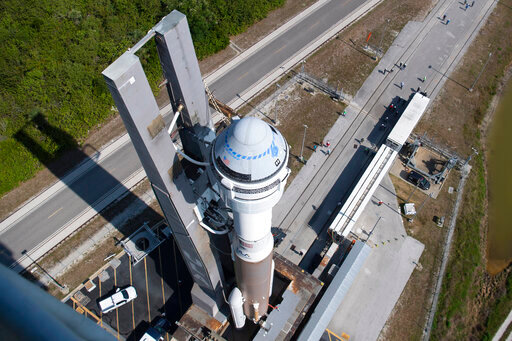 FILE - A United Launch Alliance Atlas V rocket with Boeing's CST-100 Starliner spacecraft is rolled out of the Vertical Integration Facility to the launch pad at Space Launch Complex 41 ahead of the Orbital Flight Test-2 (OFT-2) mission, Wednesday, May 18, 2022 at Cape Canaveral Space Force Station in Florida. On Thursday, Aug. 25, 2022, officials announced Boeing&rsquo;s first spaceflight with astronauts has been delayed until 2022 because of repairs that need to be made to the capsule following its last test flight. (Joel Kowsky/NASA via AP, File)