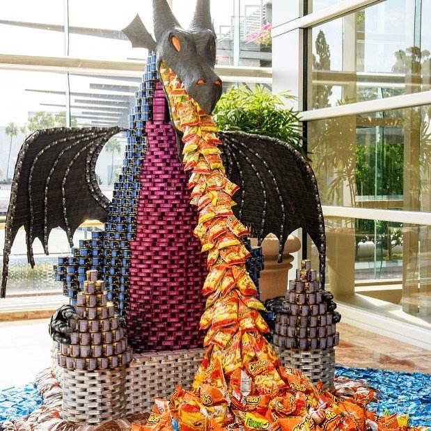 A fire-breathing dragon sculpture from a competition similar to the recently announced United We Can Food Sculpture Challenge.