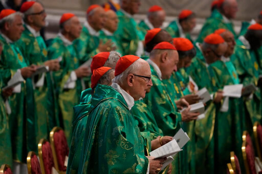 Cardinals attend a mass celebrated by Pope Francis in St. Peter's Basilica at The Vatican for the newly-created cardinals, Tuesday, Aug. 30, 2022, that concludes a two-day consistory on the Praedicate Evangelium (Preach the Gospel) apostolic constitution reforming the Roman Curia which was promulgated in March. Francis created 20 new cardinals on Saturday. (AP Photo/Andrew Medichini)