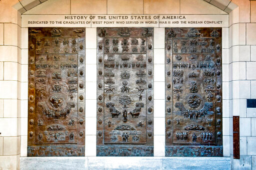 This photo provided by the U.S. Military Academy at West Point, in New York, shows the three bronze panels at one of the entrances to Bartlett Hall, at West Point, that depicts the history of the United States. A commission created by Congress is recommending that multiple historical reminders tied to Confederate officers during the Civil War be removed &mdash; many honoring Robert E. Lee, one of the academy's most famous graduates. (U.S. Military Academy at West Point via AP)