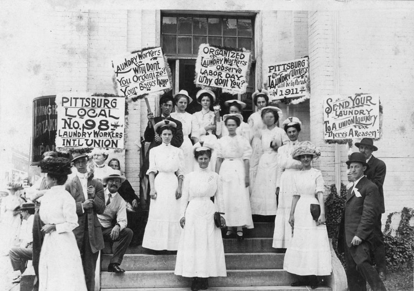 Members and friends of Pittsburg Local 98 of the International Laundry Workers Union gather on the steps of White Star Laundry to join the Pittsburg Labor Day parade in 1911.