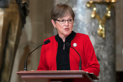 FILE - Kansas Gov. Laura Kelly speaks at the dedication and unveiling ceremony of a statue in honor of Amelia Earhart in Statuary Hall, at the Capitol in Washington, July 27, 2022. Kelly wasted little time after a decisive victory in Kansas for abortion rights before sending out a national fundraising email warning that access to the procedure would be &ldquo;on the chopping block&rdquo; if her party did not win in the November elections. (AP Photo/J. Scott Applewhite, File)