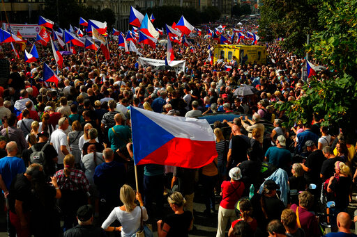 Thousands of demonstrators gather to protest against the government at the Vencesla's Square in Prague, Czech Republic, Saturday, Sept. 3, 2022. (AP Photo/Petr David Josek)