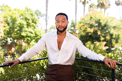 John Legend poses for a portrait on Monday, Aug. 15, 2022, in West Hollywood, Calif., to promote his latest double album &quot;Legend.&quot; (Photo by Willy Sanjuan/Invision/AP)