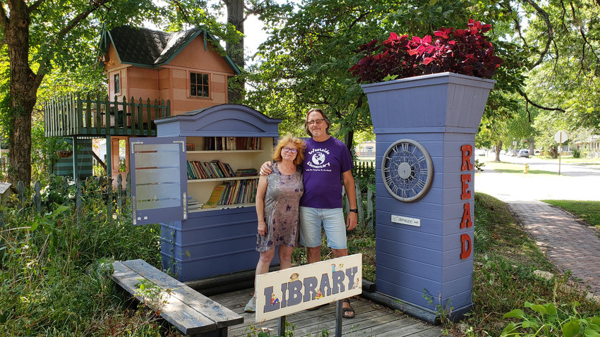 The Little Free Library hosted by Paul Hanney and Darlene Brown is open for book sharing any time. It's one of seven book-sharing boxes in Pittsburg that are chartered by the Minnesota-based non-profit literacy organization.
