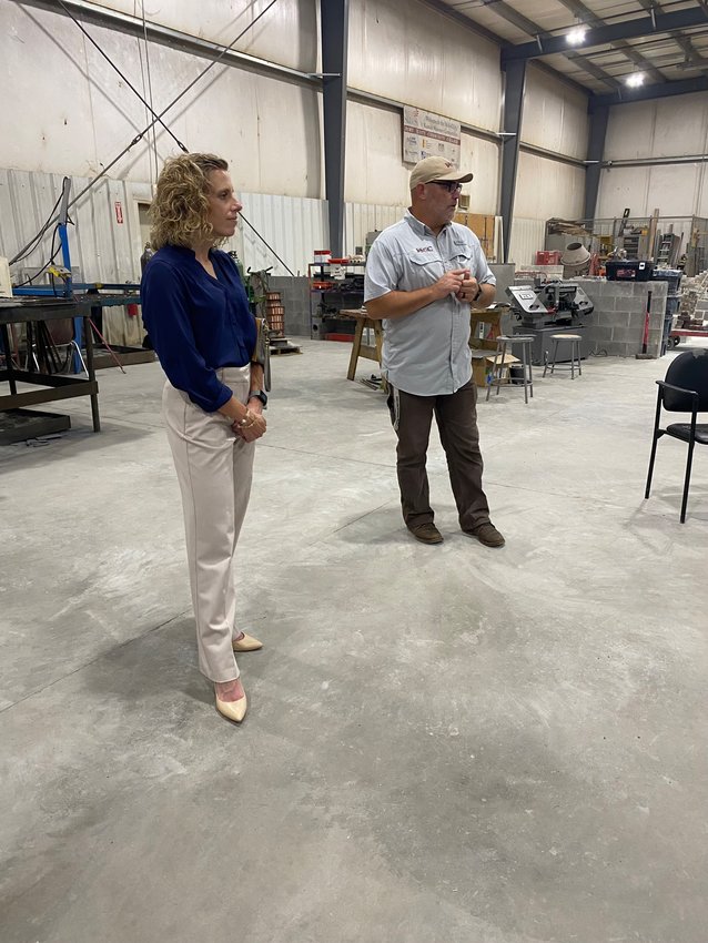Republican candidate for lieutenant governor Katie Sawyer visits with CTEC Executive Director Kris Mengarelli during a trip to Pittsburg on Thursday.