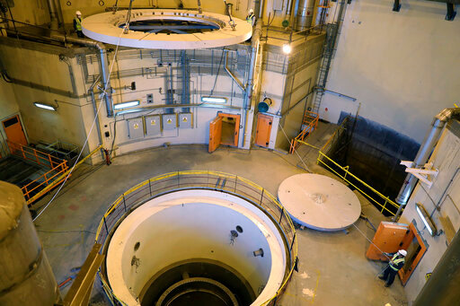 In this photo released by the Atomic Energy Organization of Iran, technicians work on the Arak heavy water reactor's secondary circuit, near Arak, 150 miles (250 kilometers) southwest of the capital Tehran, Iran, Dec. 23, 2019. France, Germany and Britain have urged Iran to agree to a proposed relaunch of the agreement limiting its nuclear program, saying final texts of a deal have been readied but Iran &ldquo;has chosen not to seize this critical diplomatic opportunity.&rdquo; The three European governments said Saturday, Sept. 10, 2022 Iran continues to escalate its nuclear program beyond any civilian justification. (Atomic Energy Organization of Iran via AP)