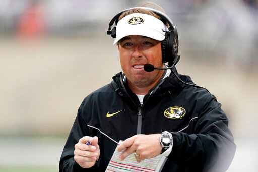 Missouri head coach Eliah Drinkwitz watches during the first half of an NCAA college football game against Kansas State Saturday, Sept. 10, 2022, in Manhattan, Kan. (AP Photo/Charlie Riedel)