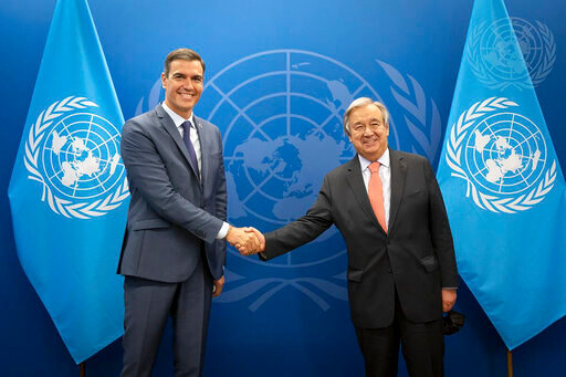 United Nations Secretary-General Ant&oacute;nio Guterres, right, poses for a photo with Spain's Prime Minister Pedro S&aacute;nchez, Monday, Sept. 19, 2022, at U.N. headquarters. (Ariana Lindquist/United Nations via AP)