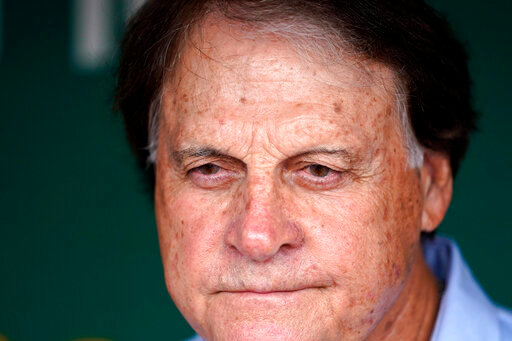 Chicago White Sox manager Tony La Russa talks to reporters in the dugout before a baseball game against the Oakland Athletics in Oakland, Calif., Sunday, Sept. 11, 2022. (AP Photo/Godofredo A. V&aacute;squez)