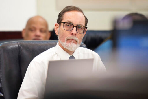 FILE - Alexander Friedmann listens during the first day of his trial at the Justice A.A. Birch Building in Nashville, Tenn., July 19, 2022. Friedmann, a longtime prison reform advocate, was sentenced to 40 years behind bars on Thursday, Oct. 6, 2022, following his conviction for hiding guns, ammunition, handcuff keys and hacksaw blades inside the walls of Nashville's new jail while it was being built. (Stephanie Amador/The Tennessean via AP, File)