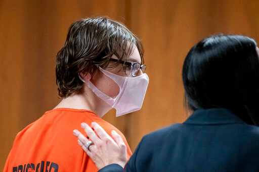 FILE - Ethan Crumbley attends a hearing at Oakland County Circuit Court in Pontiac, Mich., on Feb. 22, 2022. Crumbley, the teenager accused of killing four fellow students and injuring more at Oxford High School in Oxford, Mich., is expected to plead guilty next week, authorities said Friday, Oct. 21, 2022. (David Guralnick/Detroit News via AP, Pool, File)