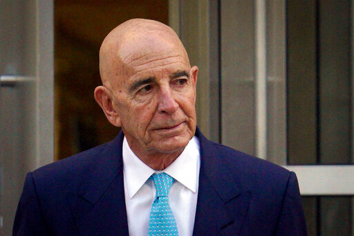 Tom Barrack exits Brooklyn Federal Court on Friday, Oct. 21, 2022, in New York. Barrack, the onetime chair of the Trump's inaugural committee, is accused of using his &ldquo;unique access&rdquo; as a longtime friend of Trump to manipulate Trump's campaign &mdash; and later his Republican administration &mdash; to advance the interests of the UAE. (AP Photo/Bebeto Matthews)