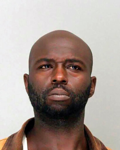 FILE - This undated booking photo provided by the Dallas County Sheriff's Office shows Henry &quot;Michael&quot; Dwight Williams. Williams, who sold a pistol to a man who used it to hold four hostages inside a Texas synagogue before being fatally shot by the FBI earlier this year, was sentenced Monday, Oct. 24, 2022, to nearly eight years in prison for a federal gun crime, the U.S. Department of Justice said. (Dallas County Sheriff's Office via AP, File)