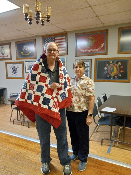 US Navy veteran Michael Harry was presented with a Quilt of Valor on Oct. 15 at the Pittsburg American Legion for his service as a damage controlman and storekeeper from 1971 to 1994, rising to the rank of petty officer 2nd class. Harry served aboard various ships, including the USS Providence off Vietnam, and USS Saratoga during Operation Desert Storm, and performed shore duty in the Philippines and Diego Garcia, before retiring as a damage control instructor from the Philadelphia Navy Yard. He is a Golden Shellback (meaning he has crossed the equator at least three times) who earned six Good Conduct Medals, a Navy Achievement Medal, and Combat Action Ribbon.