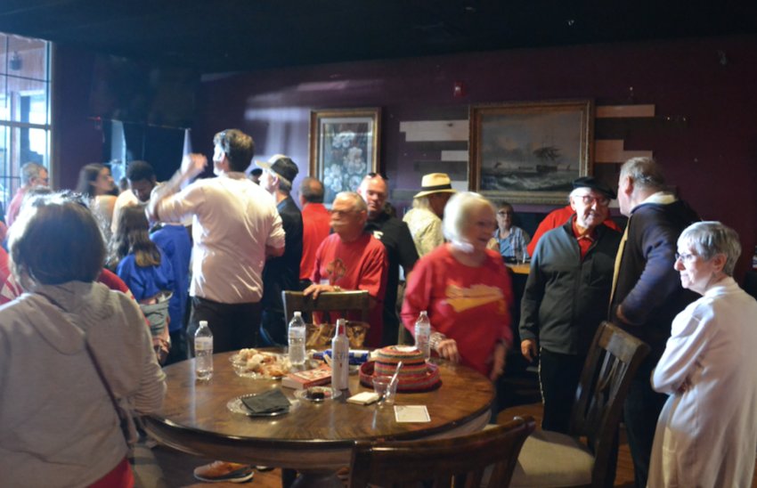 Supporters of Gov. Laura Kelly gather at Chatters Bar and Grill in Pittsburg for a chance to chat with the governor over Zoom. Kelly was scheduled to appear in person, but high winds across the state prevented her from attending.